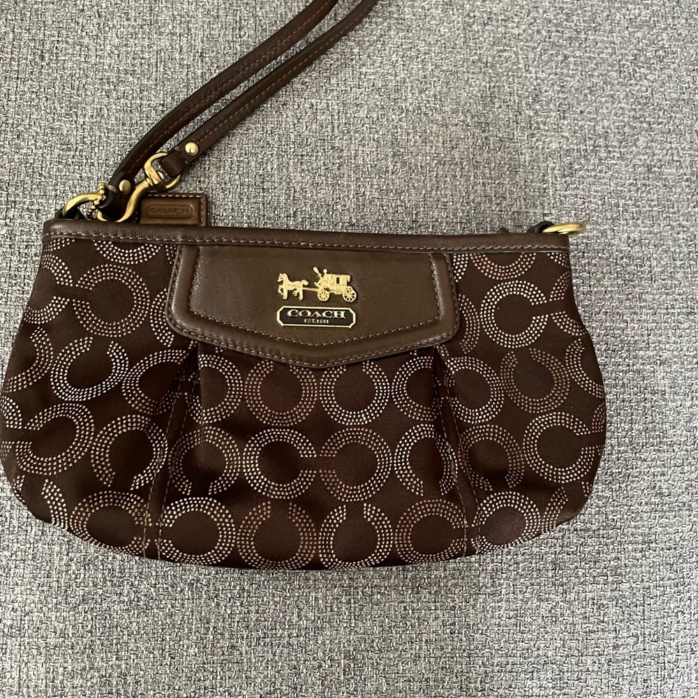 Coach Dark Brown Signature Wristlet in good used condition